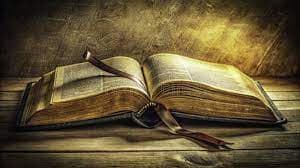 Open Bible with a pen
